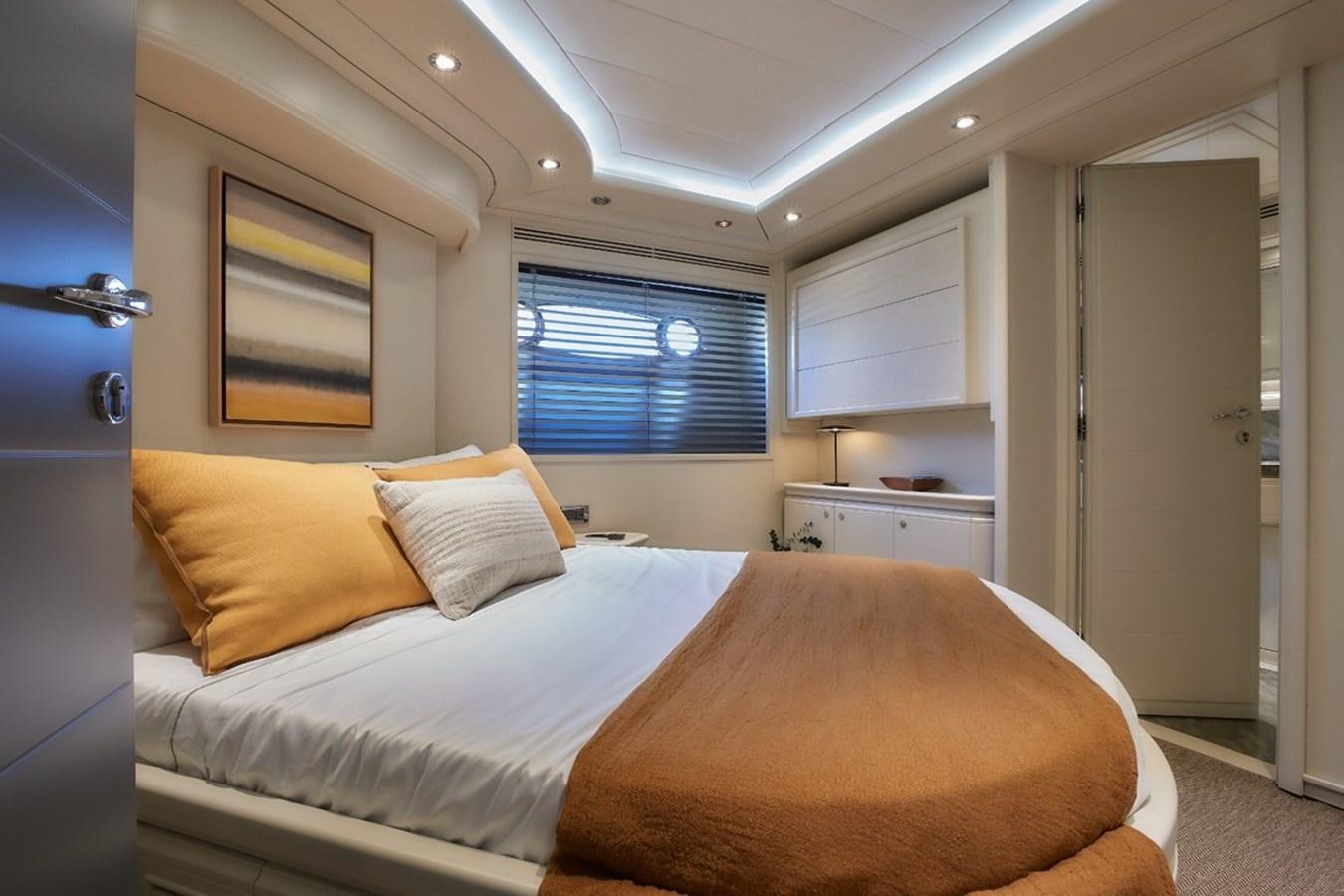 a bed in a room aboard CAMARIK Yacht for Sale
