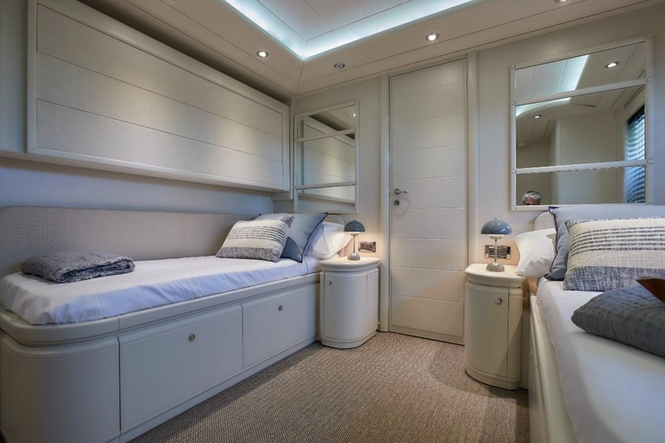 a room with two beds aboard CAMARIK Yacht for Sale