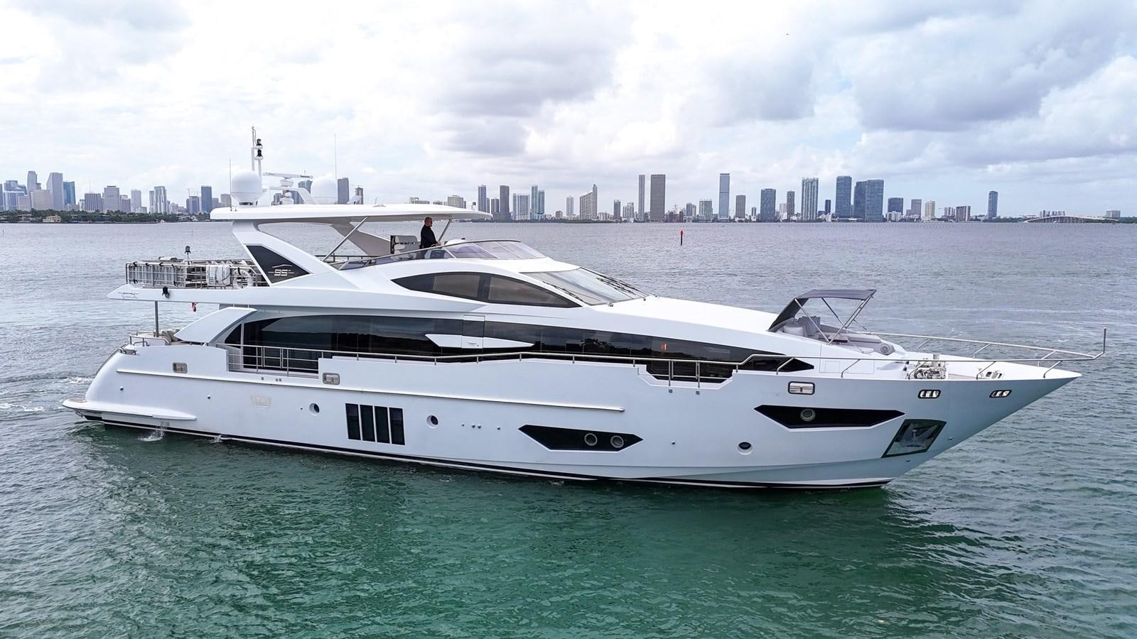 a white yacht in the water aboard 95 RAISED PILOTHOUSE Yacht for Sale