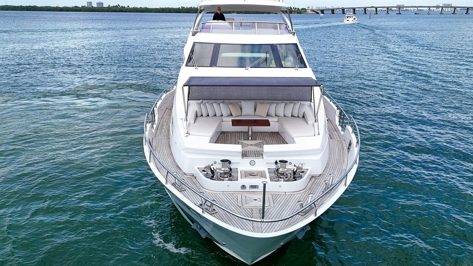 a boat in the water aboard 95 RAISED PILOTHOUSE Yacht for Sale