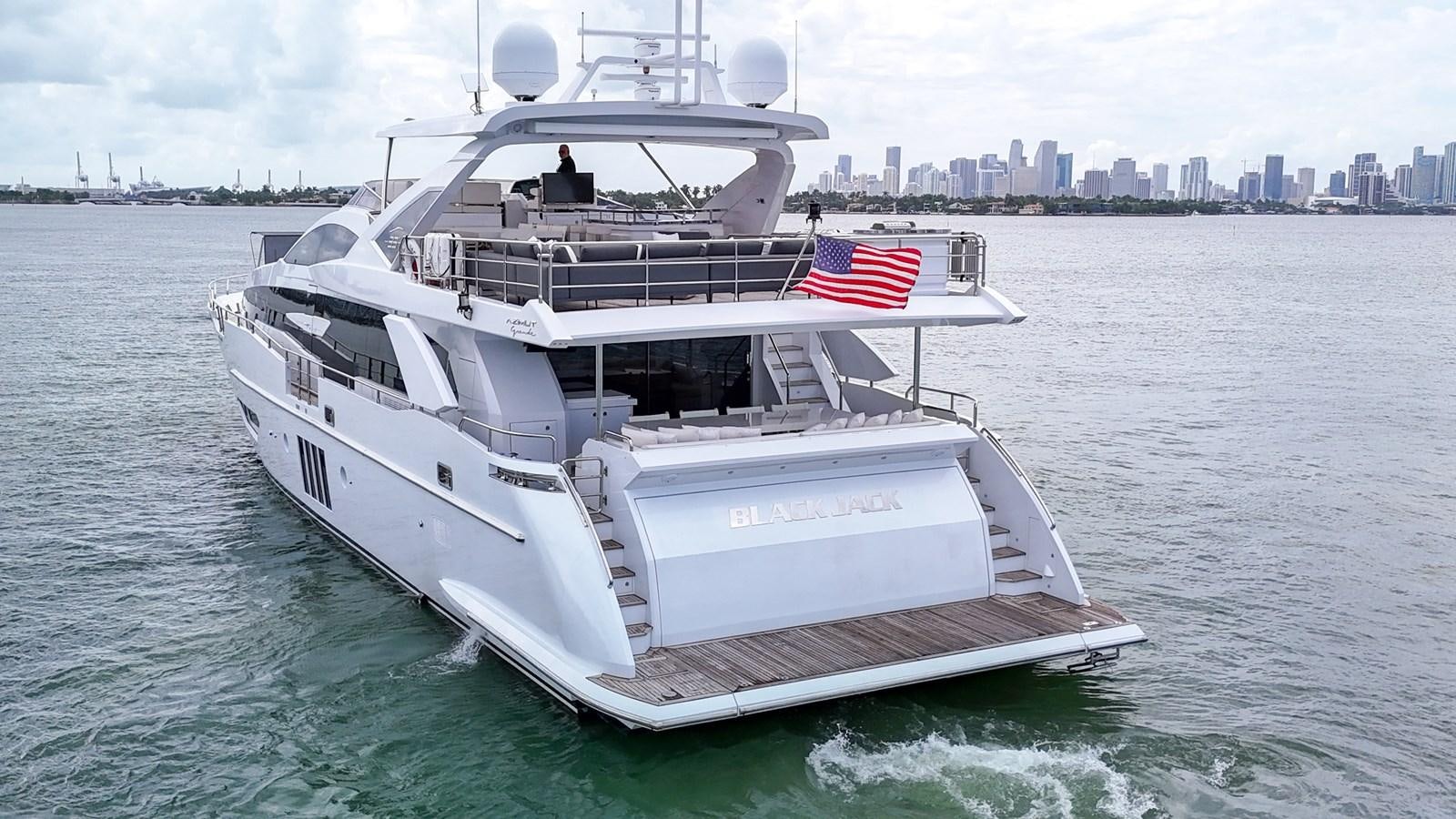 a boat on the water aboard 95 RAISED PILOTHOUSE Yacht for Sale