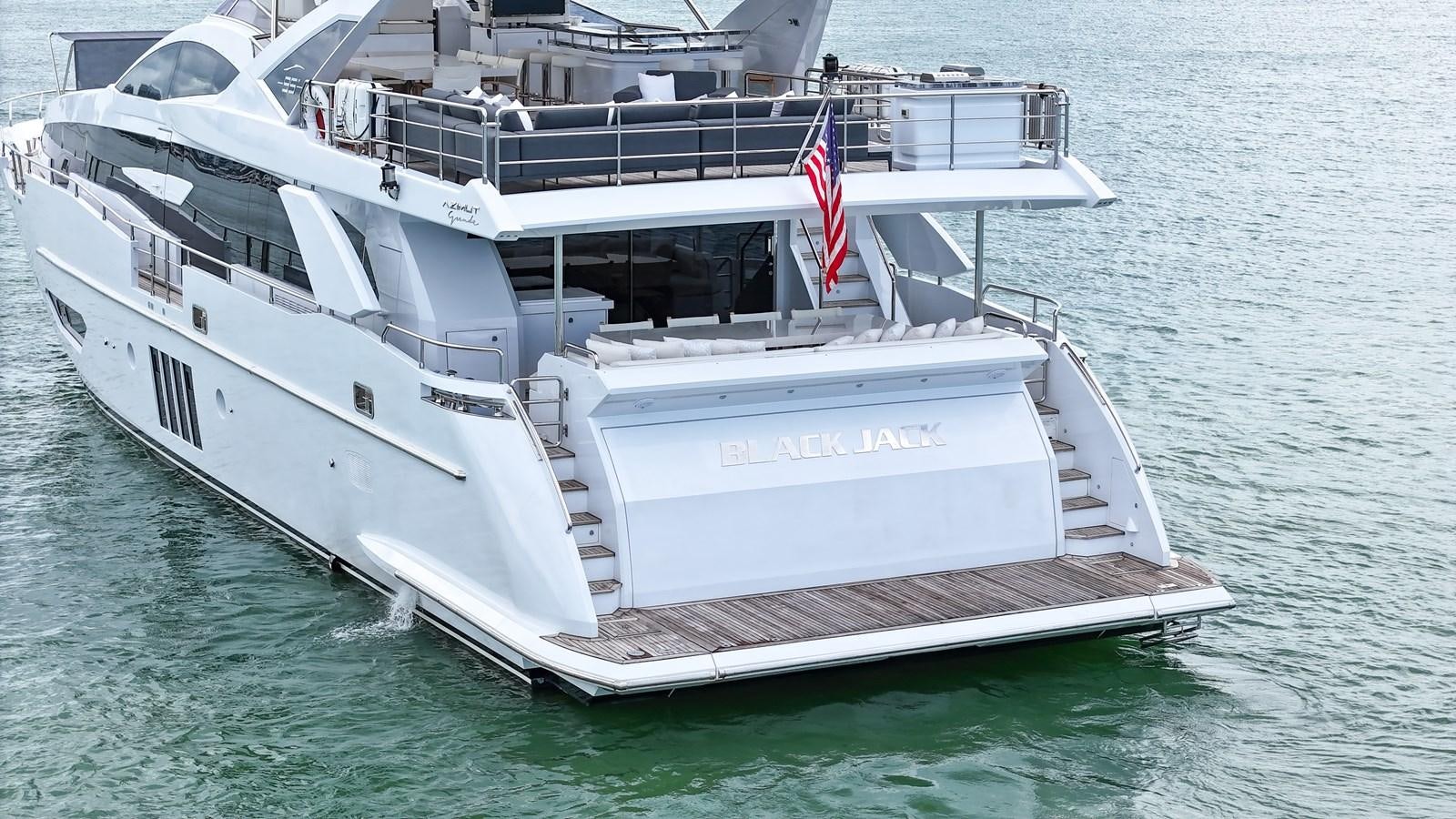 a large white boat on the water aboard 95 RAISED PILOTHOUSE Yacht for Sale