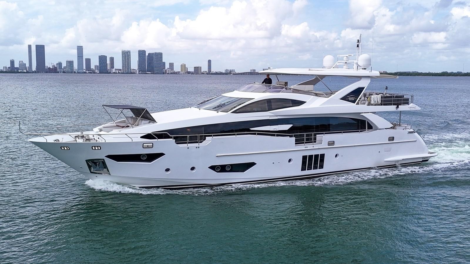 a white yacht in the water aboard 95 RAISED PILOTHOUSE Yacht for Sale