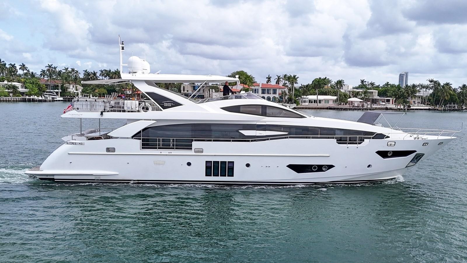 a white yacht in the water aboard 95 RAISED PILOTHOUSE Yacht for Sale