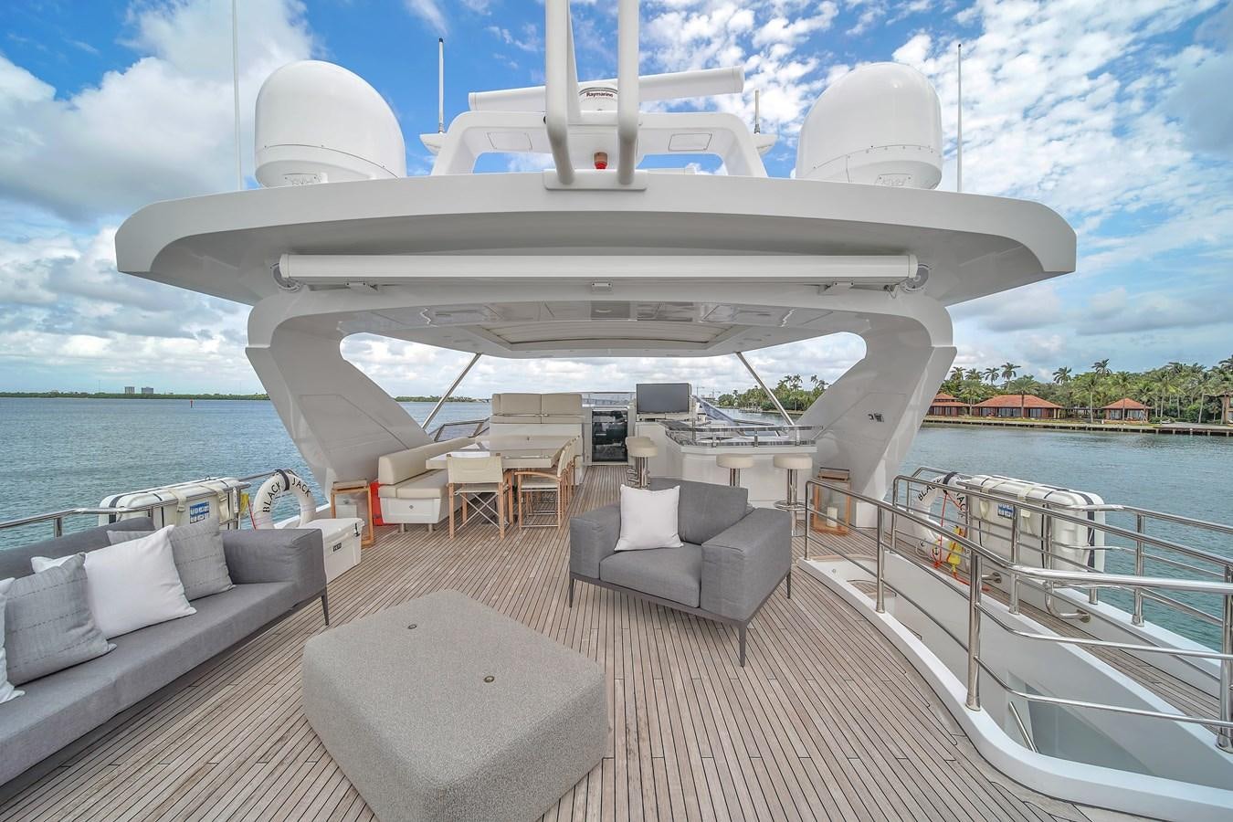 a boat on a body of water aboard 95 RAISED PILOTHOUSE Yacht for Sale