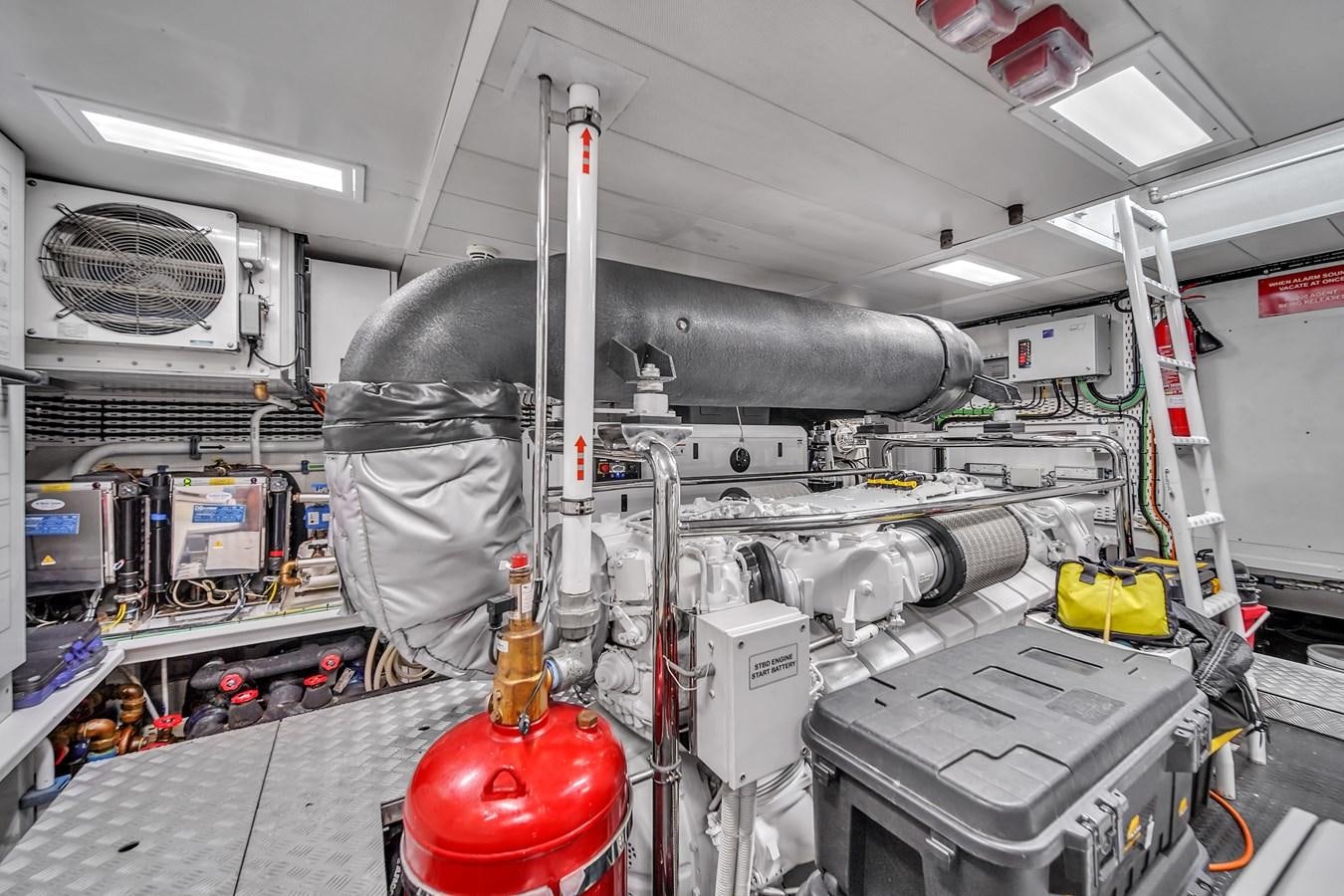 a large machine in a factory aboard 95 RAISED PILOTHOUSE Yacht for Sale