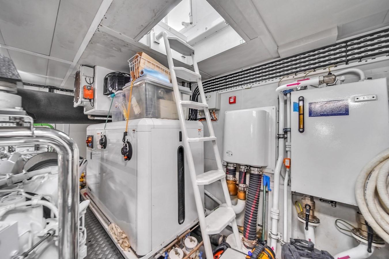 a large white machine with several tubes aboard 95 RAISED PILOTHOUSE Yacht for Sale
