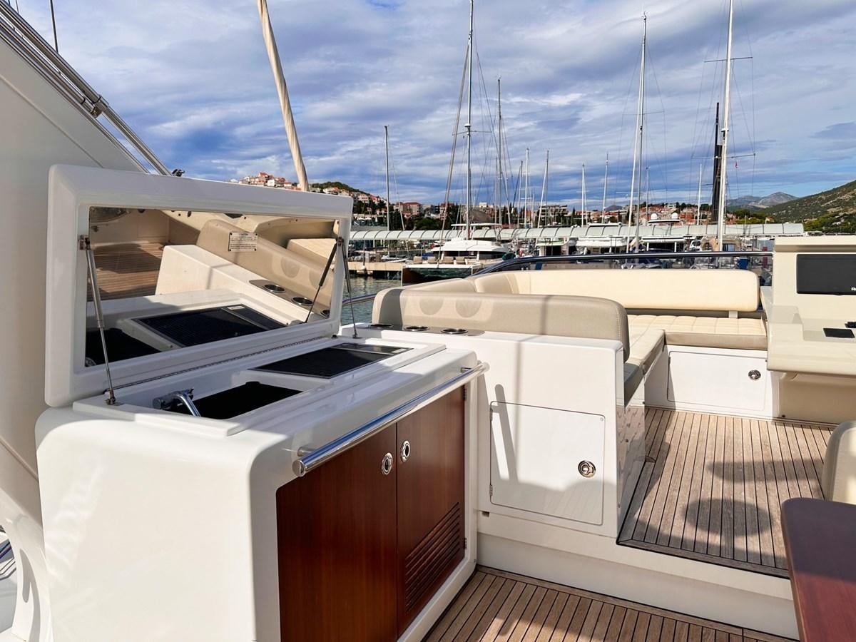 a deck with a deck and boats aboard TAMARA II Yacht for Sale