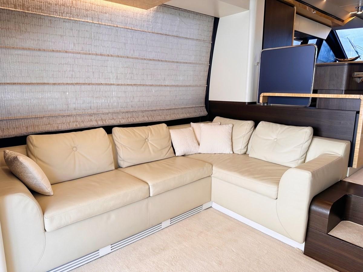 a couch in a room aboard TAMARA II Yacht for Sale