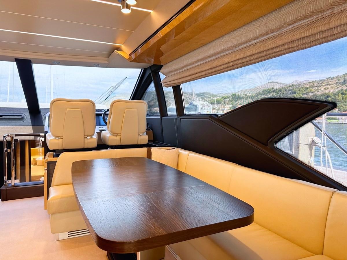 a table and chairs in a tent aboard TAMARA II Yacht for Sale