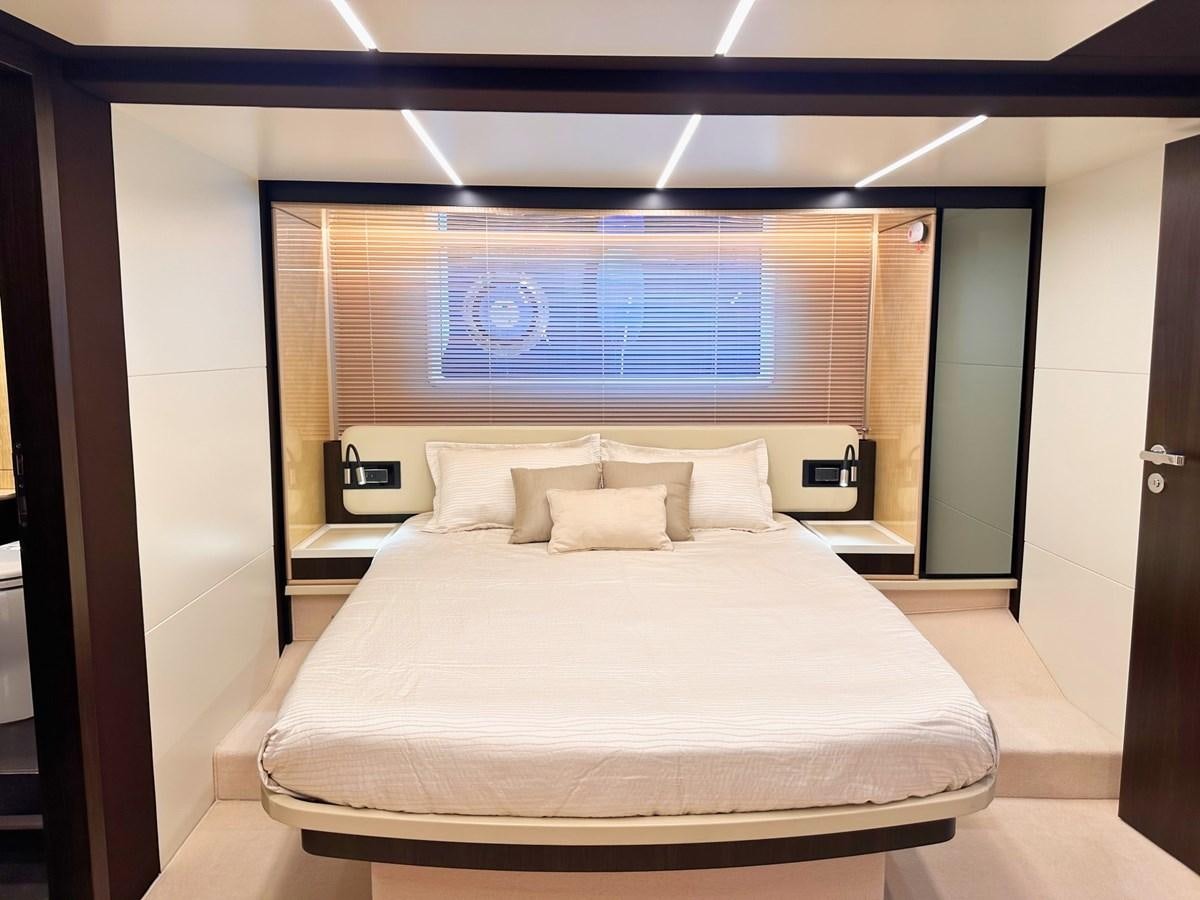 a large bed in a room aboard TAMARA II Yacht for Sale