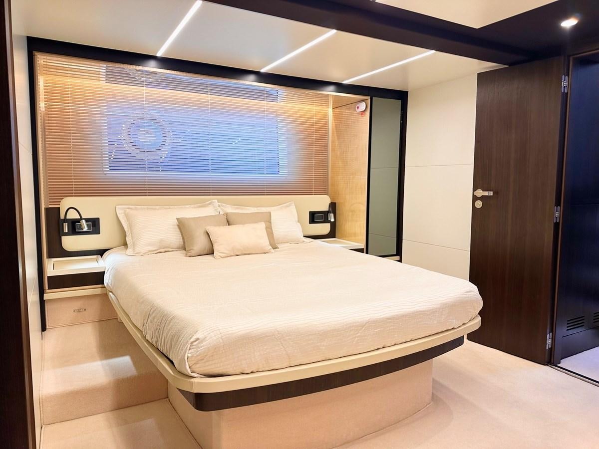 a bed in a room aboard TAMARA II Yacht for Sale