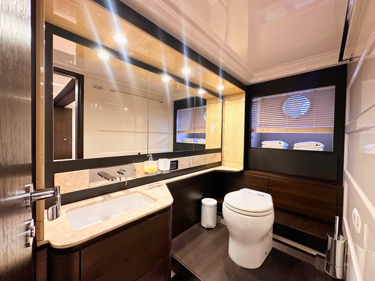 a bathroom with a large mirror aboard TAMARA II Yacht for Sale