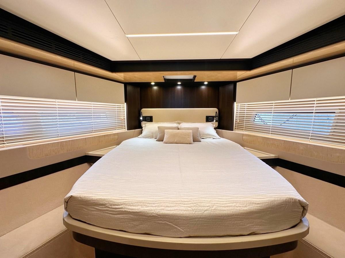 a bed in a room aboard TAMARA II Yacht for Sale