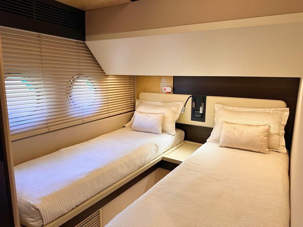 a couple of beds in a hotel room aboard TAMARA II Yacht for Sale