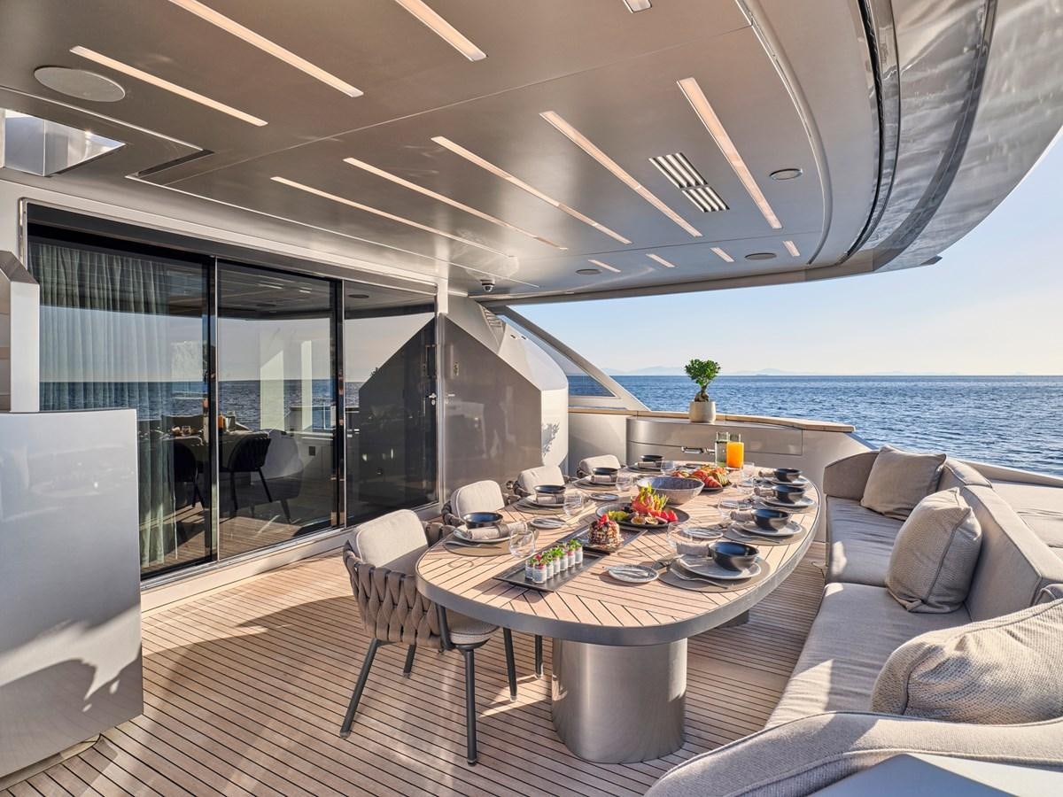 a large living room with a large balcony overlooking the ocean aboard SEAMMETRY Yacht for Sale