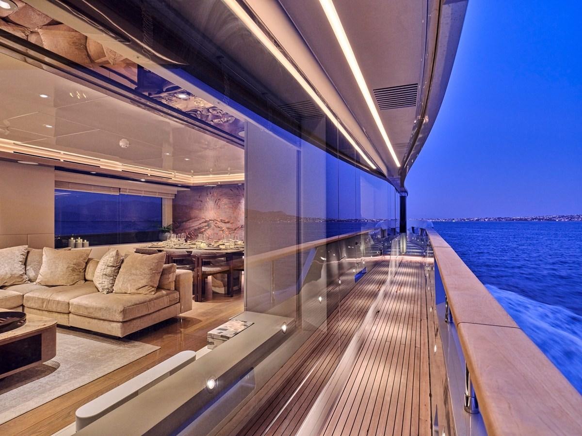 a deck with a couch and a pool aboard SEAMMETRY Yacht for Sale