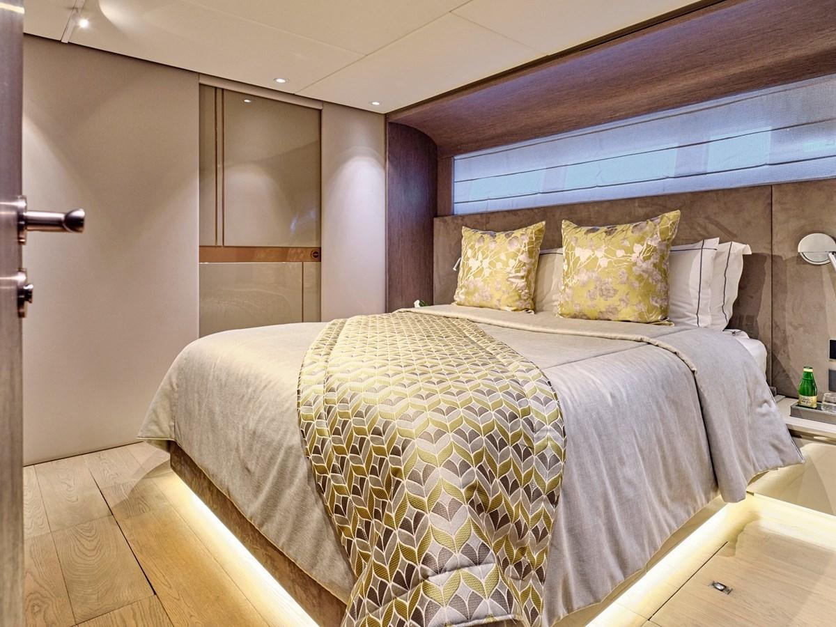 a bedroom with two beds aboard SEAMMETRY Yacht for Sale