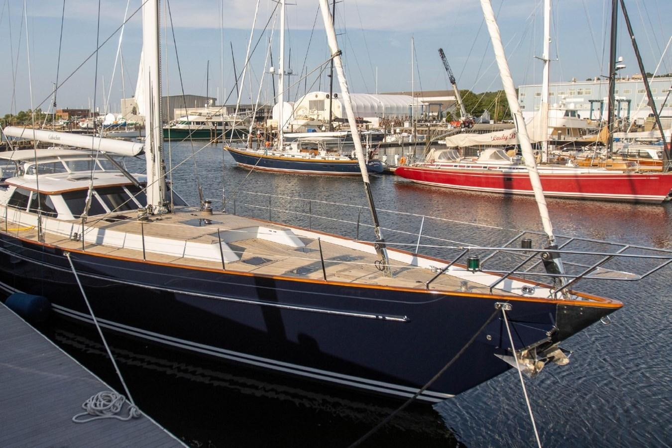 a group of boats are parked in a harbor aboard CABOCHON Yacht for Sale