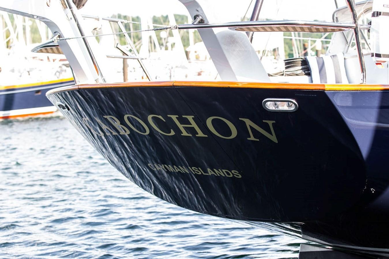 a boat with a large body of water in the background aboard CABOCHON Yacht for Sale