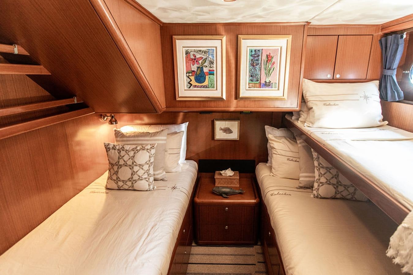 a room with two beds aboard CABOCHON Yacht for Sale