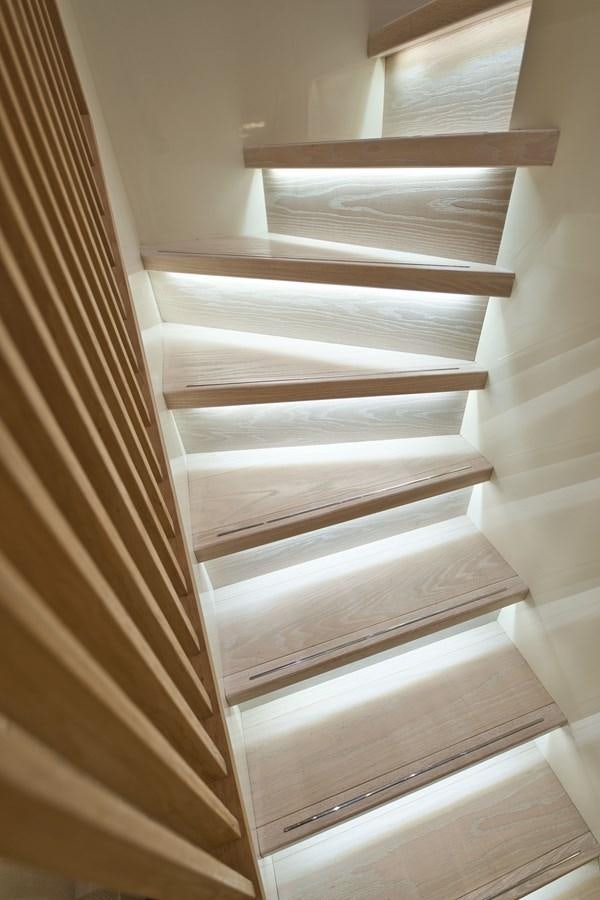 a white shelf with a wooden frame aboard ROCK X Yacht for Sale