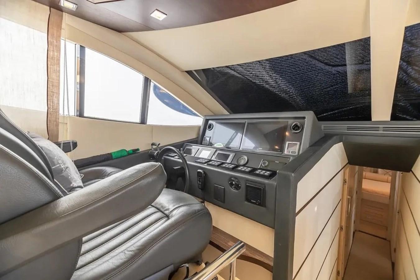 a room with a bed and a desk aboard BELLA VITA Yacht for Sale