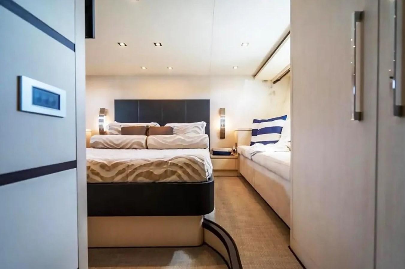 a room with two beds aboard BELLA VITA Yacht for Sale