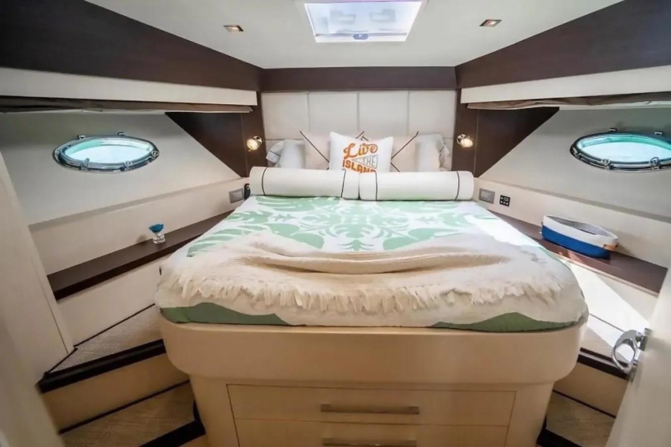 a bed in a room aboard BELLA VITA Yacht for Sale