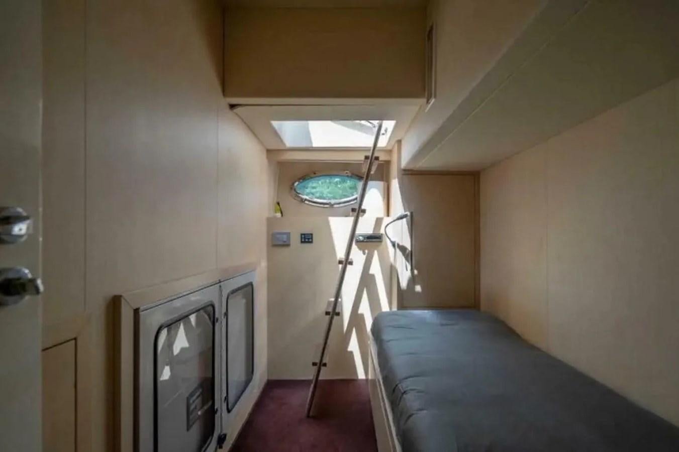 a bed in a room aboard BELLA VITA Yacht for Sale