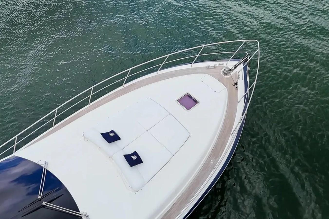 a white boat in the water aboard BELLA VITA Yacht for Sale