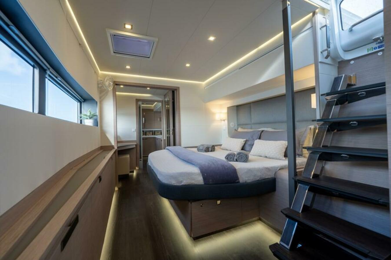 a bedroom with a bunk bed aboard 2022 FOUNTAINE PAJOT POWER 67 Yacht for Sale