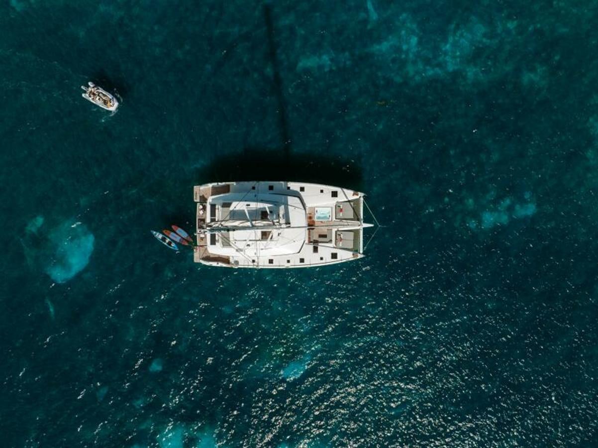 a boat in the water aboard 2022 FOUNTAINE PAJOT POWER 67 Yacht for Sale