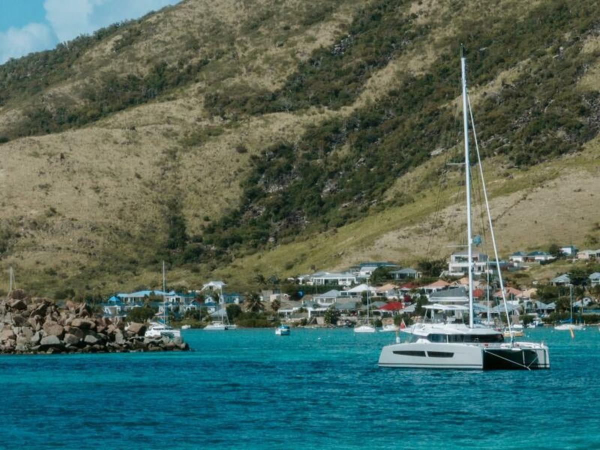 a boat sailing on the water aboard 2022 FOUNTAINE PAJOT POWER 67 Yacht for Sale