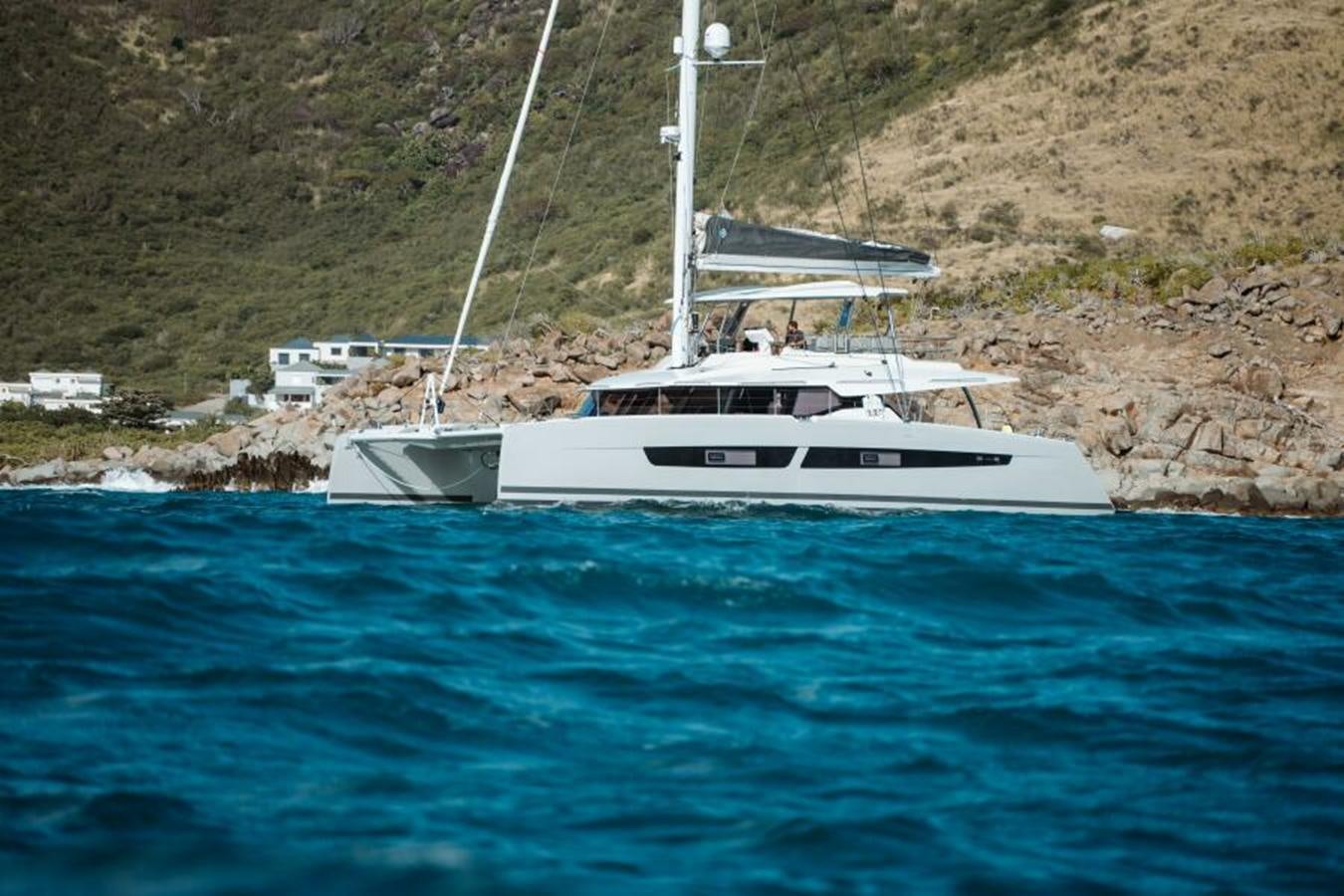 a boat on the water aboard 2022 FOUNTAINE PAJOT POWER 67 Yacht for Sale