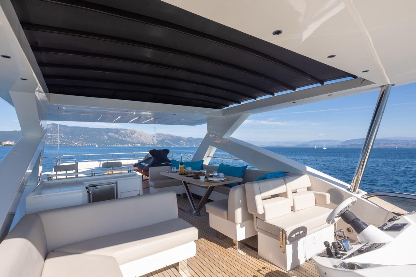 a boat with a view of the ocean and the ocean aboard SHINE R Yacht for Sale