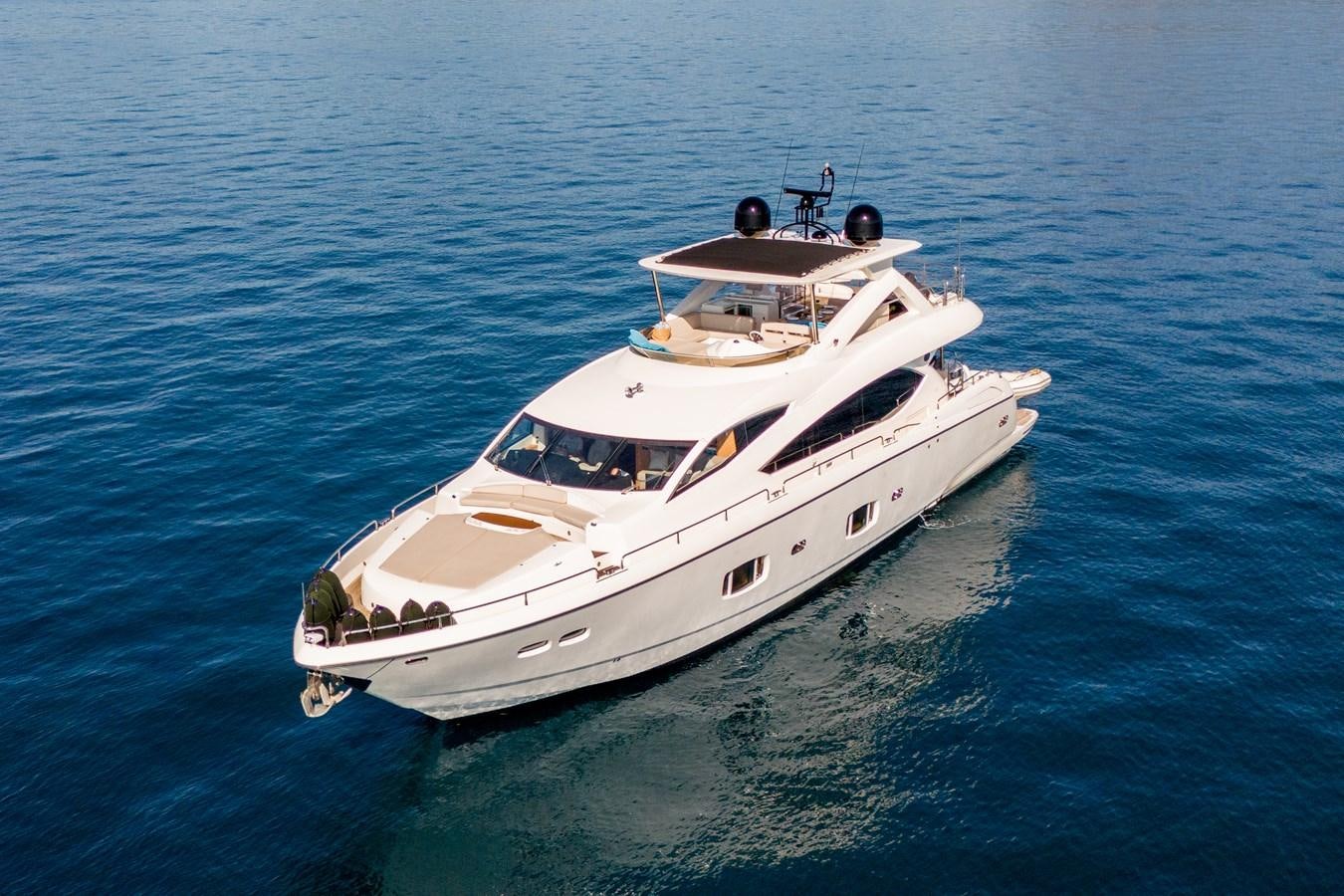 a white yacht in the water aboard SHINE R Yacht for Sale