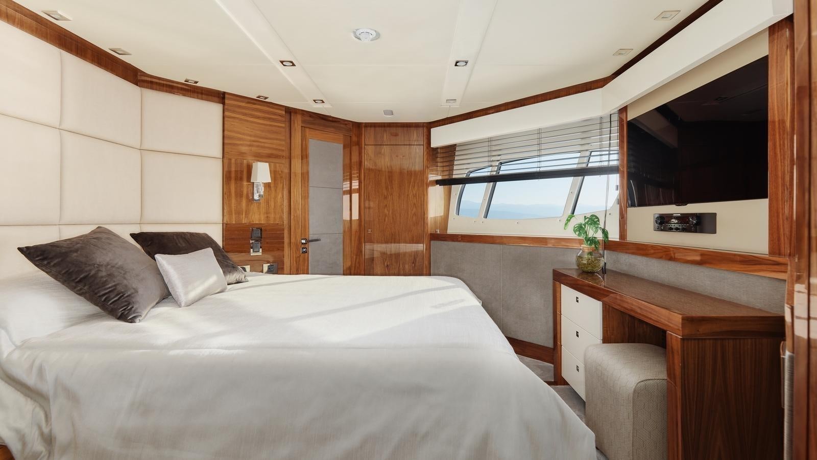 a bed in a room aboard WICKED PLAY Yacht for Sale
