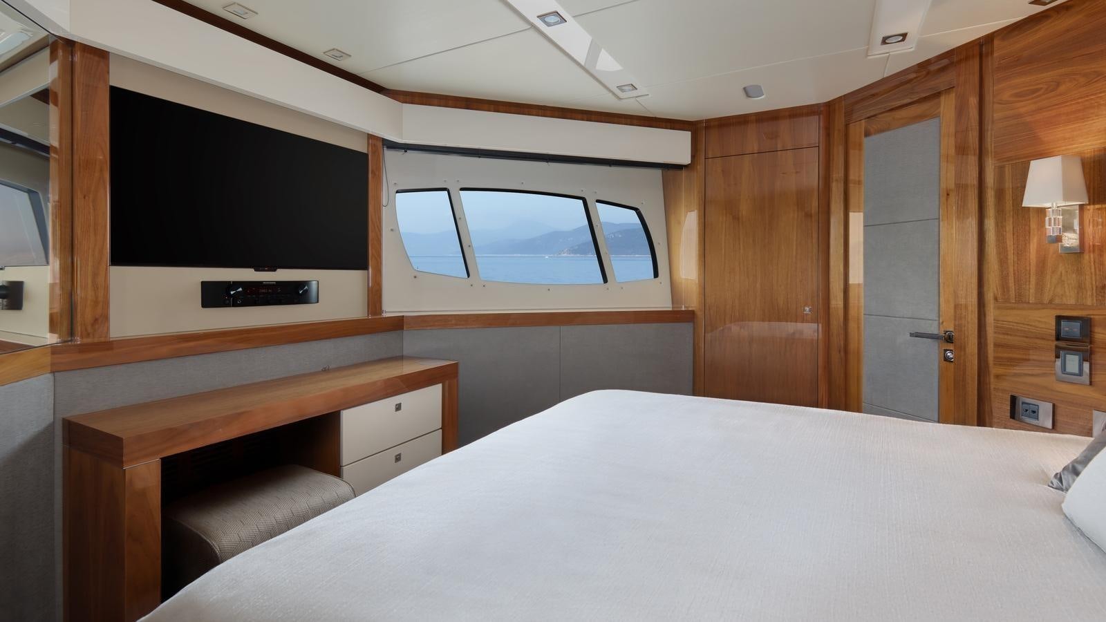 a bed in a room aboard WICKED PLAY Yacht for Sale
