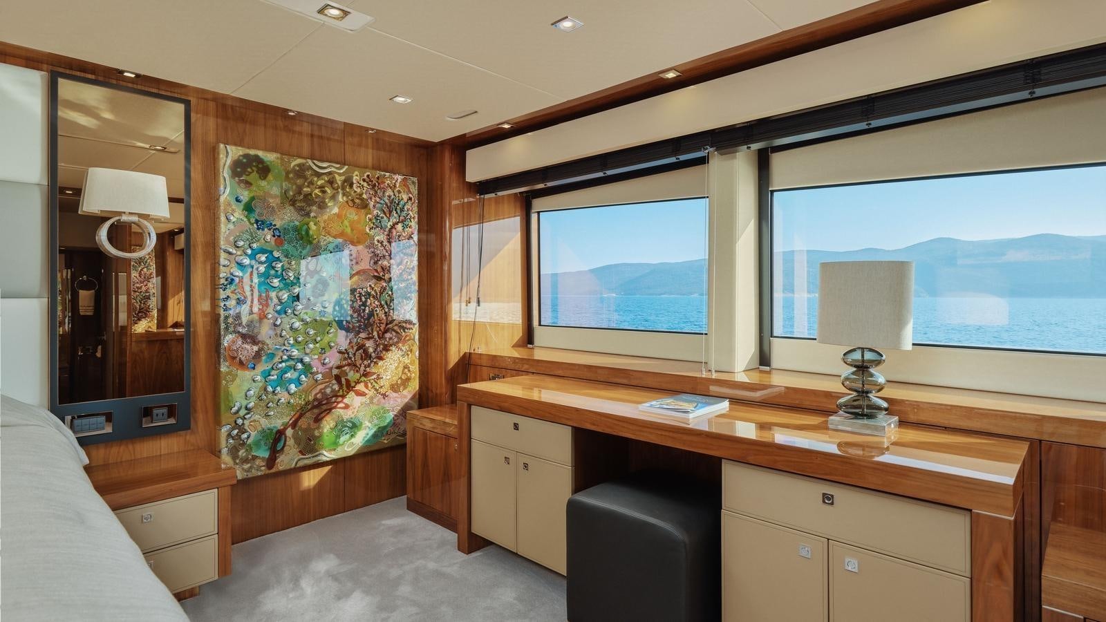 a room with a large screen aboard WICKED PLAY Yacht for Sale