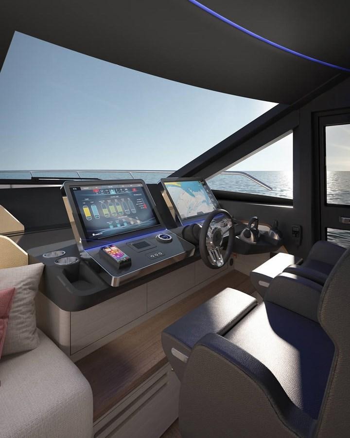 inside of a car with a screen and a laptop on a table aboard 2026 ABSOLUTE 70 FLY Yacht for Sale
