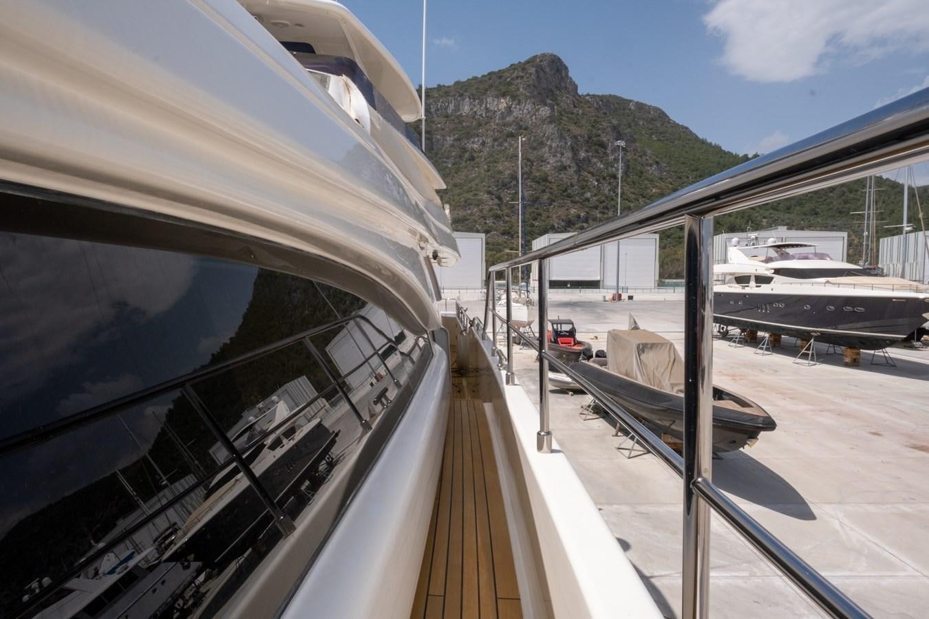 a view of a mountain from a plane window aboard BLEU BLANC Yacht for Sale