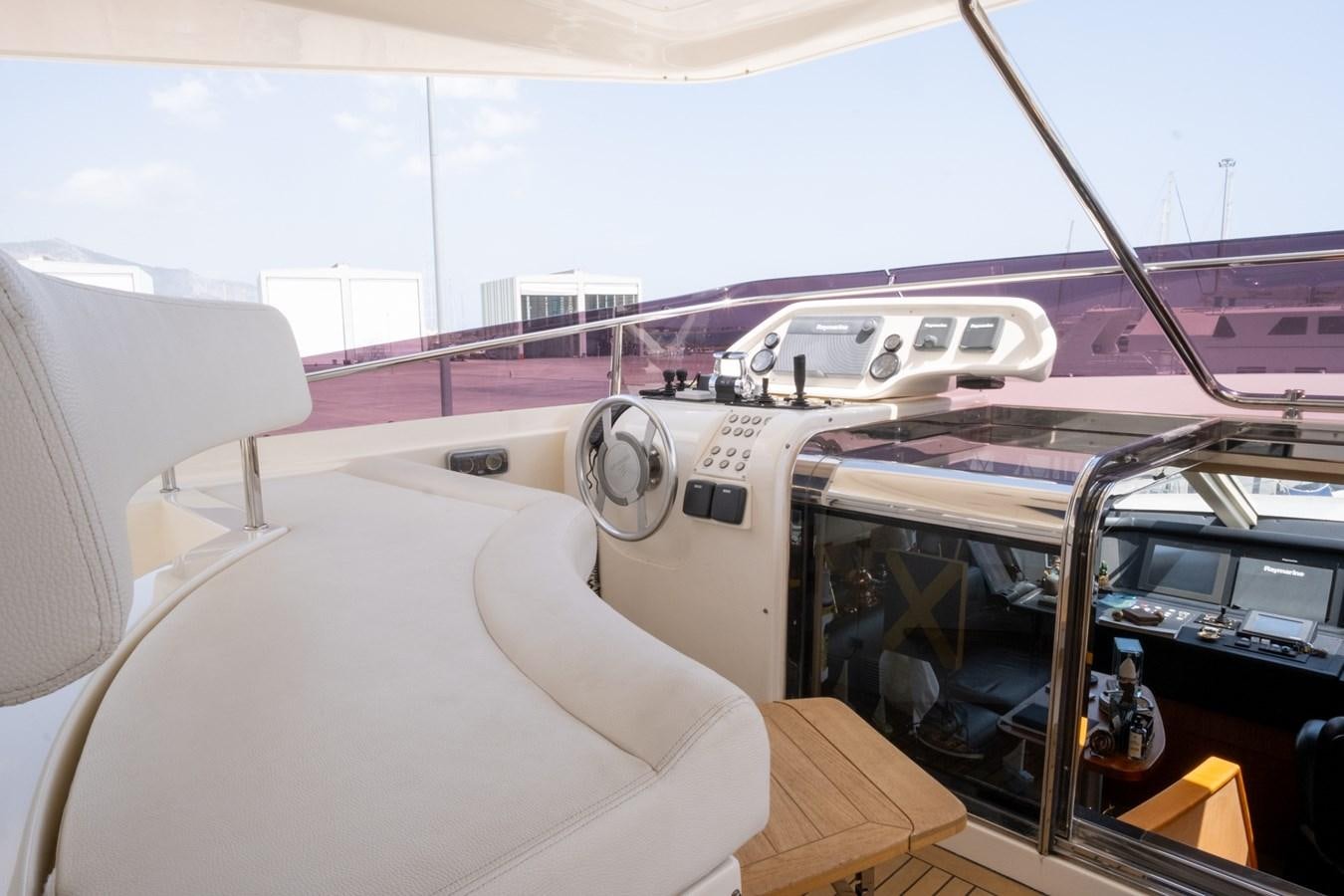 the inside of a car aboard BLEU BLANC Yacht for Sale