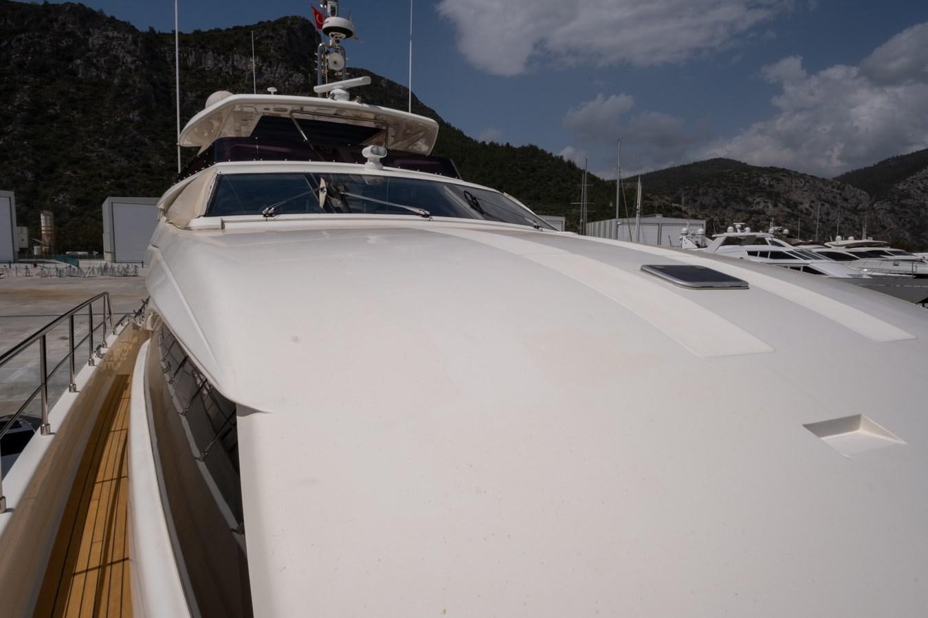 a white car parked on a road aboard BLEU BLANC Yacht for Sale