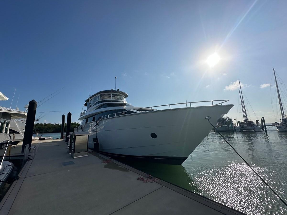 a large white boat docked aboard WATER RODEO Yacht for Sale