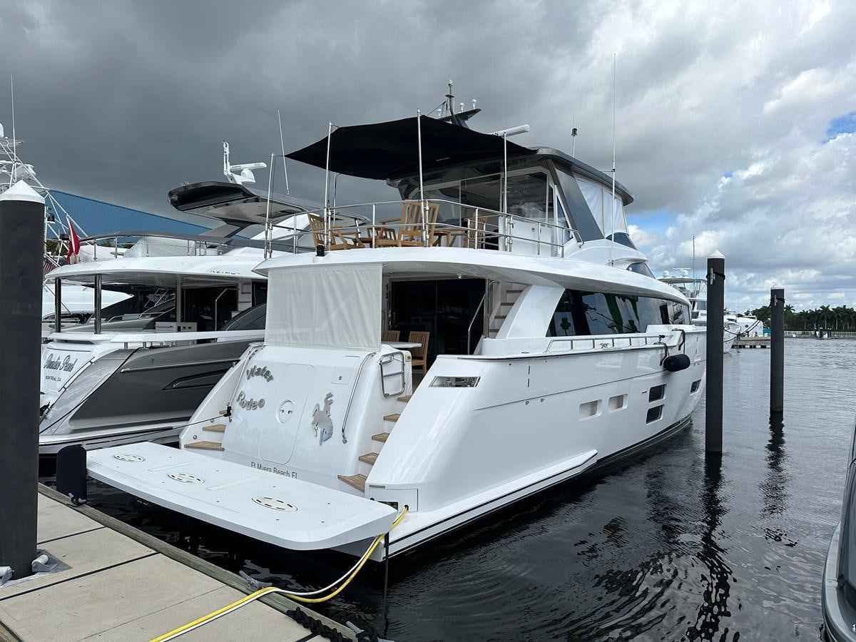 a white boat docked aboard WATER RODEO Yacht for Sale