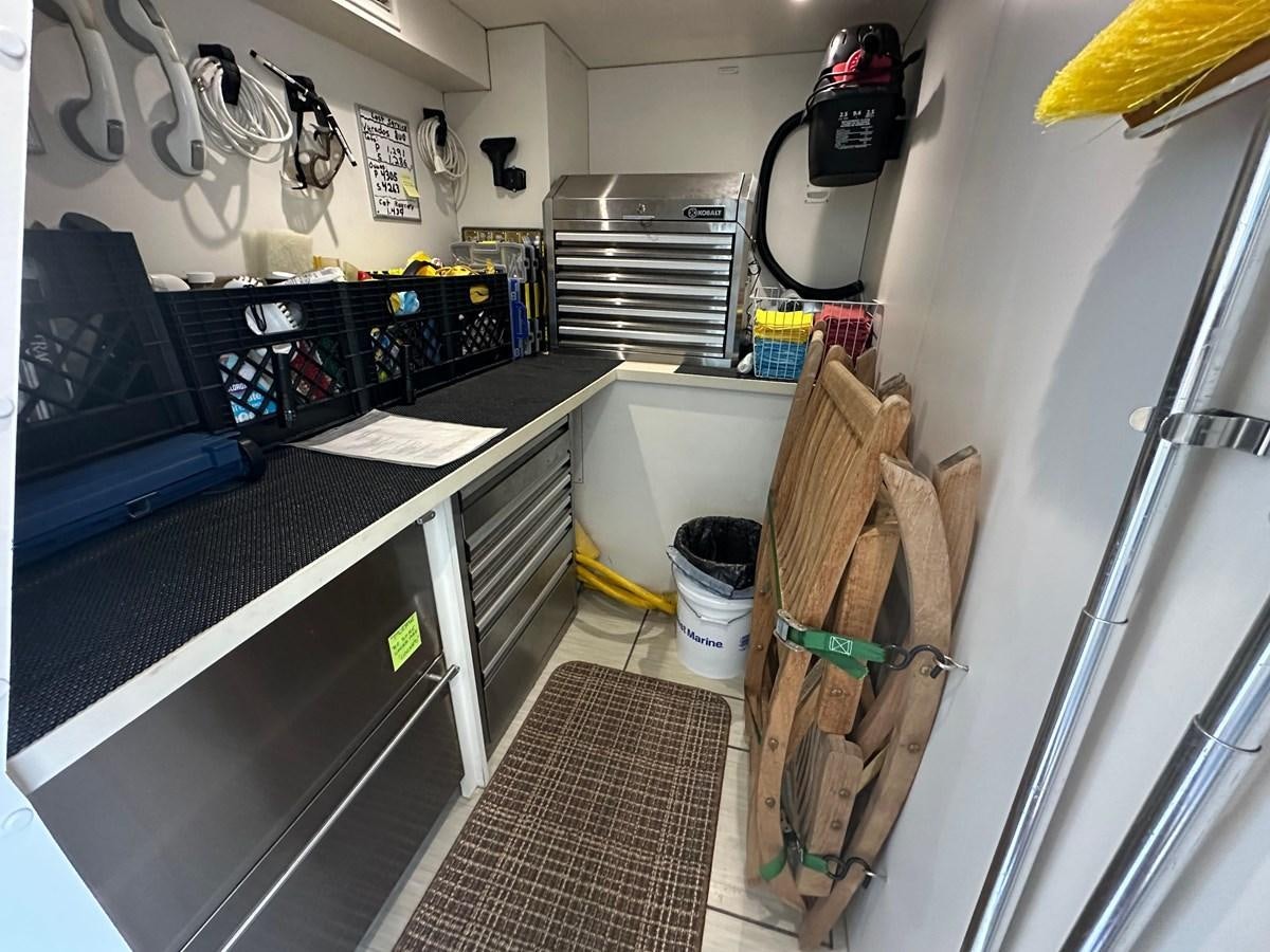 a kitchen with a sink and a counter aboard WATER RODEO Yacht for Sale