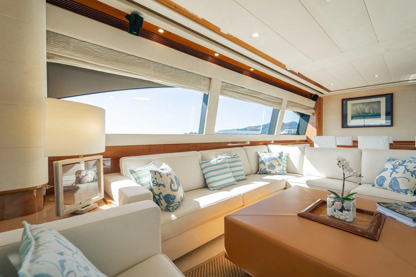 a living room with a large window aboard LADY HELENA Yacht for Sale