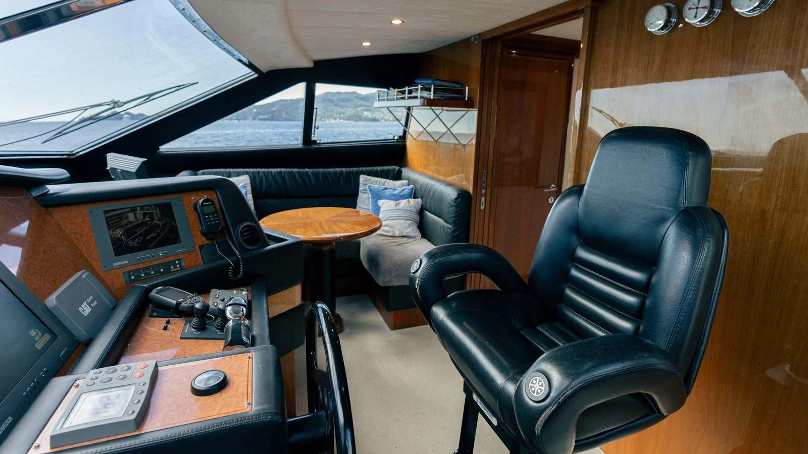 a room with a chair and desk aboard LADY HELENA Yacht for Sale