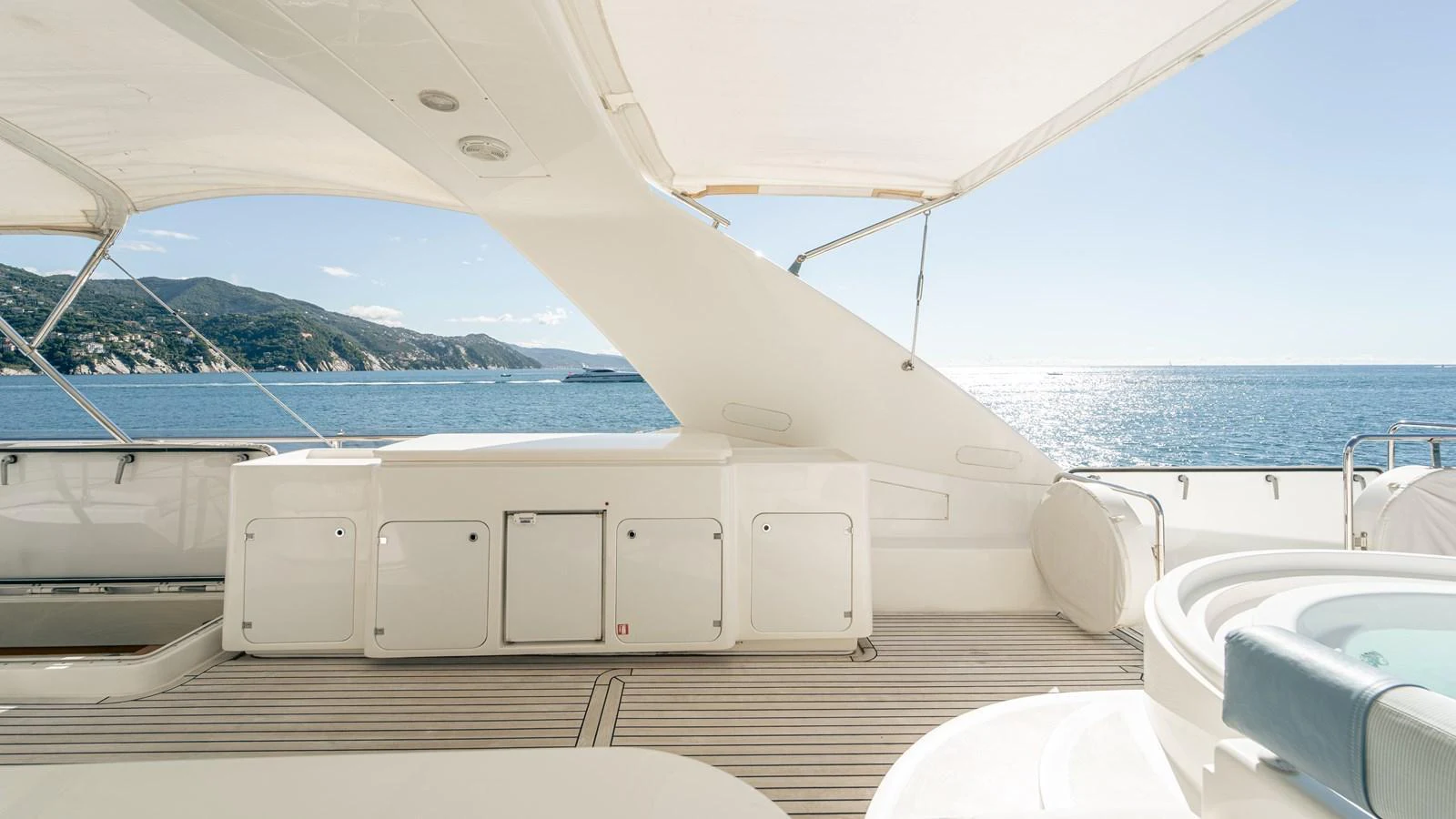 a boat with a sink and a view of the water aboard LADY HELENA Yacht for Sale